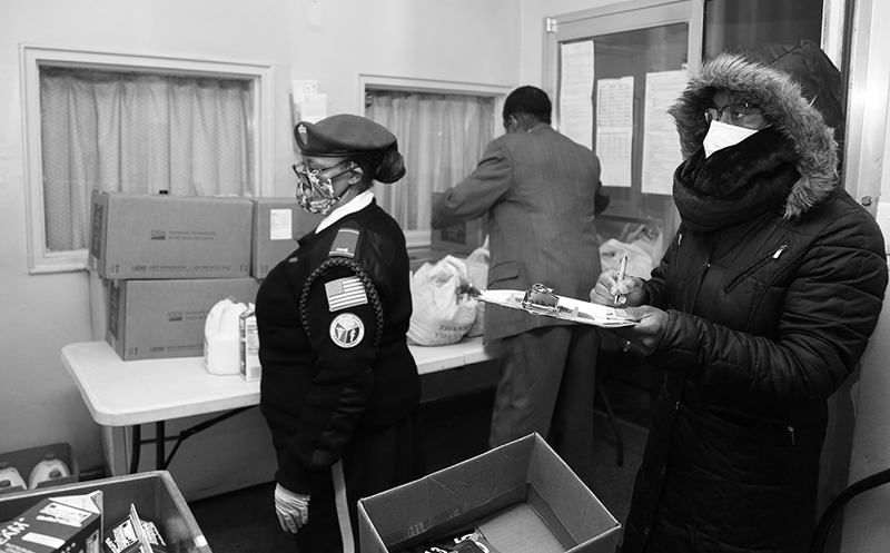 2020 : Food Lines : Seventh Day Adventists Help the Needy : Streetlife : New York City : Times Square : Richard Moore : Photographer : Photojournalist